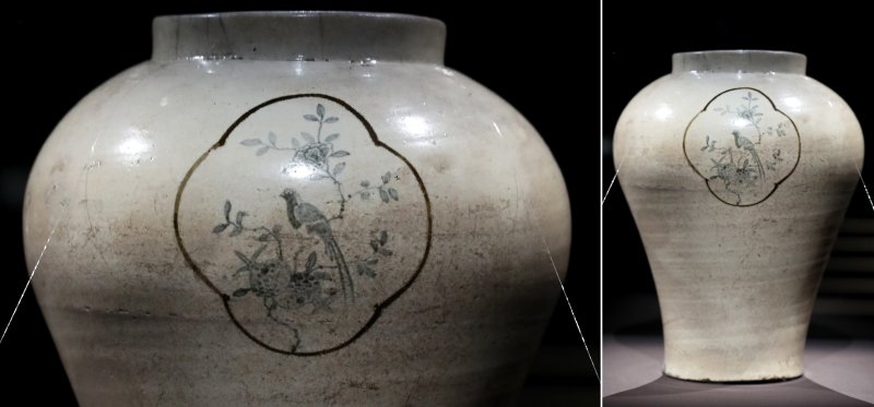 [서울=뉴시스] 박진희 기자 = 오랜 세월의 얼룩과 어우러져 진중한 분위기를 연출하는 '백자 청화 철화 화조문 호(白磁 靑畵 鐵畵 花鳥文 壺)'는 어깨가 넓으면서 부드러운 곡선을 그리며 내려오는 형태의 조선 중기 항아리 특징을 나타내고 있다. 가장 볼록한 어깨선에는 철화 안료로 마름모 모양의 꽃창을 그려 정갈한 구획을 만들어 그 안에 청화 안료로 석류, 복숭아, 모란, 새 세마리를 묘사했다. 2023.02.26. pak7130@newsis.com