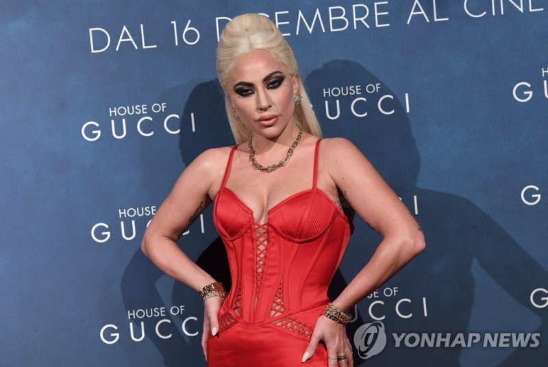 epa09580724 American singer, songwriter and actress, Lady Gaga, on the red carpet of the premiere of movie 'House of Gucci', in Milan, Italy, 13 November 2021. Parts of the new movie of Ridley Scott's 'House of Gucci' in which Stefani Joanne Angelina Germanotta, better known by her stage name 'Lady 