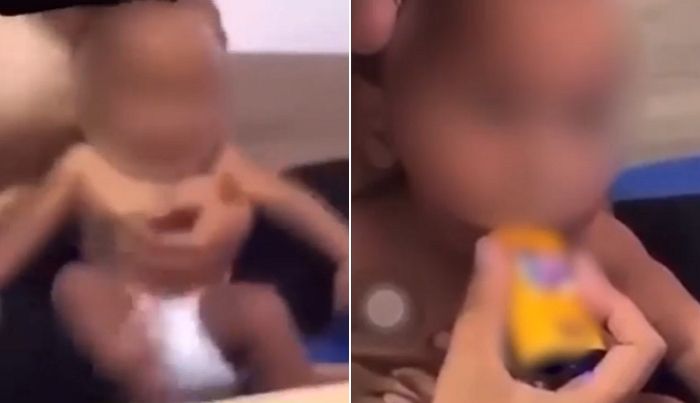호주에서 한 엄마와 이모가 아기의 입에 전자담배를 물리고 있다. 페이스북 캡처