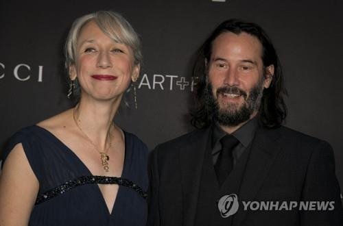 할리우드 스타 키아누 리브스(오른쪽)와 여자친구 알렉산드라 그랜트(왼쪽) [EPA 연합뉴스 자료사진. 재판매 및 DB 금지]