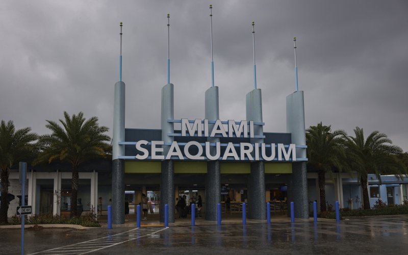 The entrance to Miami Seaquarium is seen, Thursday, March 30, 2023, in Miami. An unlikely coalition of a theme park owner, animal rights group and NFL owner-philanthropist announced Thursday that a plan is in place to return Lolita, an orca that has lived at the Miami Seaquarium for more than 50 yea