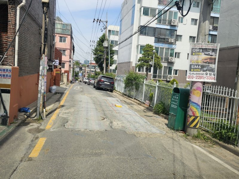 대전 서구 가장동의 한 도로가 임시포장이 안 된 상태로 부직포만 덮혀 있다.(독자 제공) /뉴스1