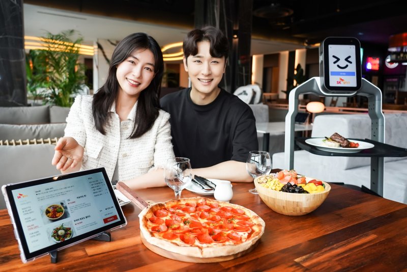 SK쉴더스의 스마트오더·서빙로봇, 매장 무인화 트렌드 됐다