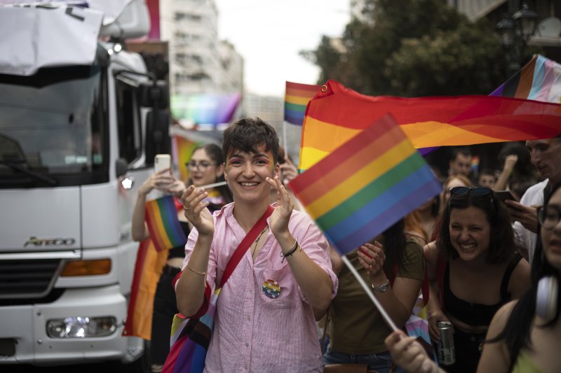 People participate in the annual Pride parade, in Athens, Saturday, June 10, 2023. June marks the beginning of Pride month in the U.S. and many parts of the world, a season intended to celebrate the lives and experiences of LGBTQ+ communities and to protest against attacks on hard-won civil rights g