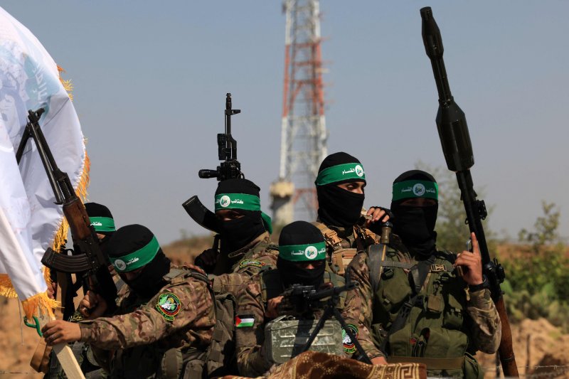 팔레스타인 가자지구 무장정파 하마스 산하 알 카삼 여단 병사들이 지난해 7월 19일 가자지구에서 행진하고 있다.AFP연합뉴스