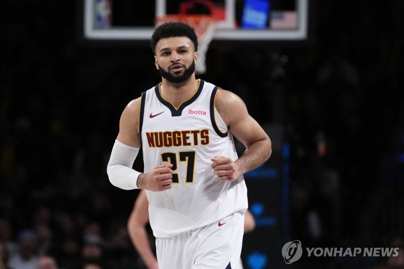 저말 머리 Denver Nuggets' Jamal Murray reacts after scoring during the second half of an NBA basketball game against the Brooklyn Nets, Friday, Dec. 22, 2023, in New York. (AP Photo/Frank Franklin II)