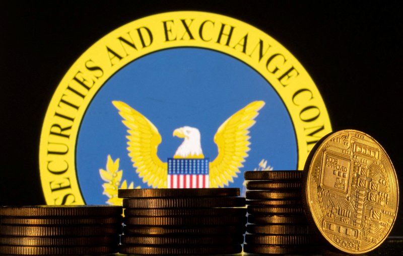 FILE PHOTO: U.S. Securities and Exchange Commission logo and representations of cryptocurrency are seen in this illustration taken June 6, 2023. REUTERS/Dado Ruvic/Illustration/File Photo