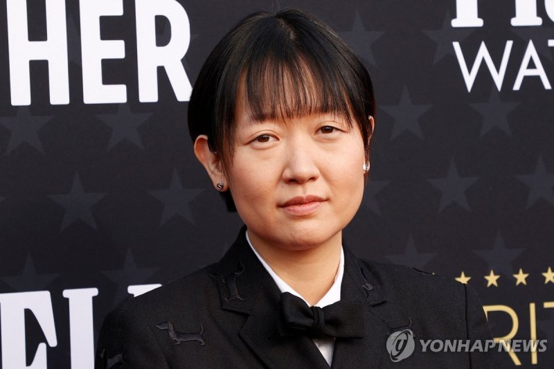 South Korean-Canadian director Celine Song arrives for the 29th Annual Critics Choice Awards at the Barker Hangar in Santa Monica, California on January 14, 2024. (Photo by Michael TRAN / AFP)