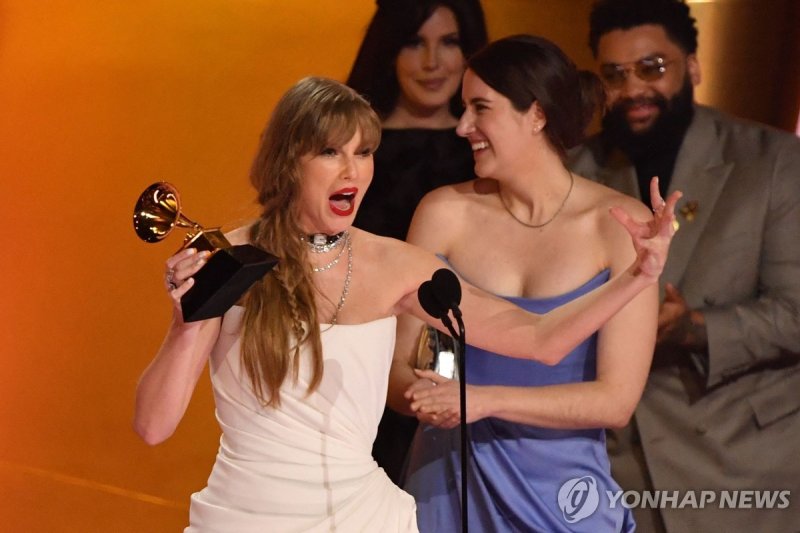 US singer-songwriter Taylor Swift accepts the Album Of The Year award for "Midnights" on stage during the 66th Annual Grammy Awards at the Crypto.com Arena in Los Angeles on February 4, 2024. (Photo by Valerie Macon / AFP)