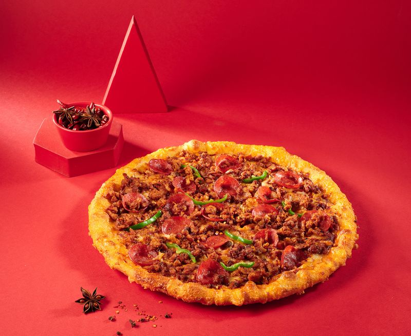 도미노피자가 출시한 마라 불고기 피자.