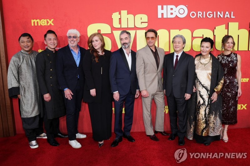 Cast members Phanxine, Robert Downey Jr., Kieu Chinh and executive producers Viet Thanh, Niv Fichman, Amanda Burrell, Don Mckellar, Park Chan-wook and Susan Downey attend a premiere for the television series "The Sympathizer", in Los Angeles, California, U.S. April 9, 2024. REUTERS/Mario Anzuoni