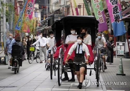 '엔저' 싼 맛에 일본여행 갔는데…관광객에 '돈' 더 걷겠다는 日