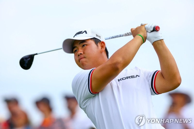 Paris 2024 Olympics - Golf - Men's Round 3 - Le Golf National, Guyancourt, France - August 03, 2024. Tom Kim of South Korea in action. REUTERS/Matthew Childs