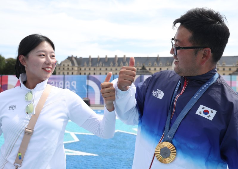 파리의 3관왕, 김우진과 임시현의 쌍따봉 / 사진 = 연합뉴스