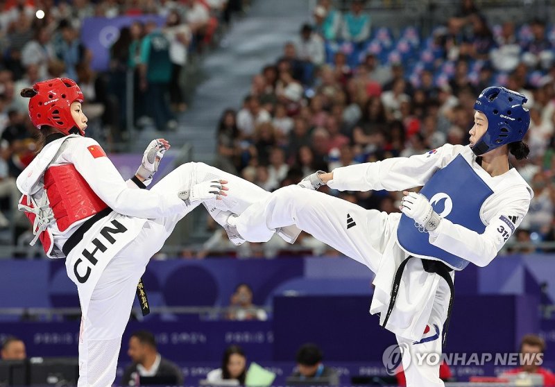 김유진은 세계랭킹 1위의 난적을 꺾고 결승 진출에 성공했다 / 사진 = 연합뉴스