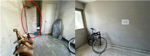 송파구의 한 아파트 계단에 자전거 등이 놓여있고, 방화문(붉은색 원)도 열려있다. [촬영 김연수]