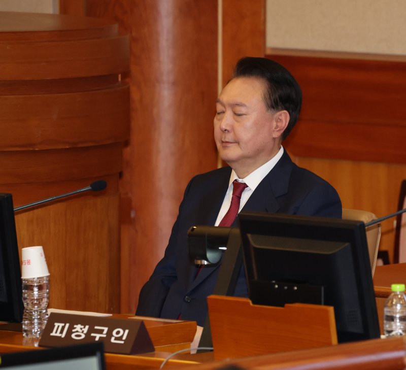 윤석열 대통령이 23일 오후 서울 종로구 헌법재판소에서 열린 탄핵심판 4차 변론기일에 출석해 있다. 2025.1.23/뉴스1 ⓒ News1 사진공동취재단