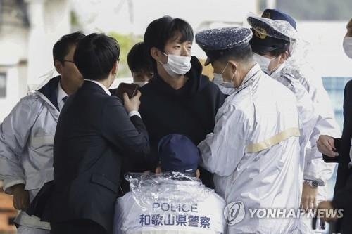 범행 현장에서 체포된 기무라 류지 (출처=연합뉴스)