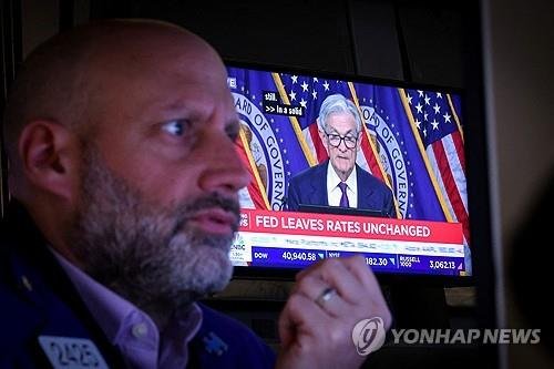 뉴욕증권거래소의 트레이더 (출처=연합뉴스)