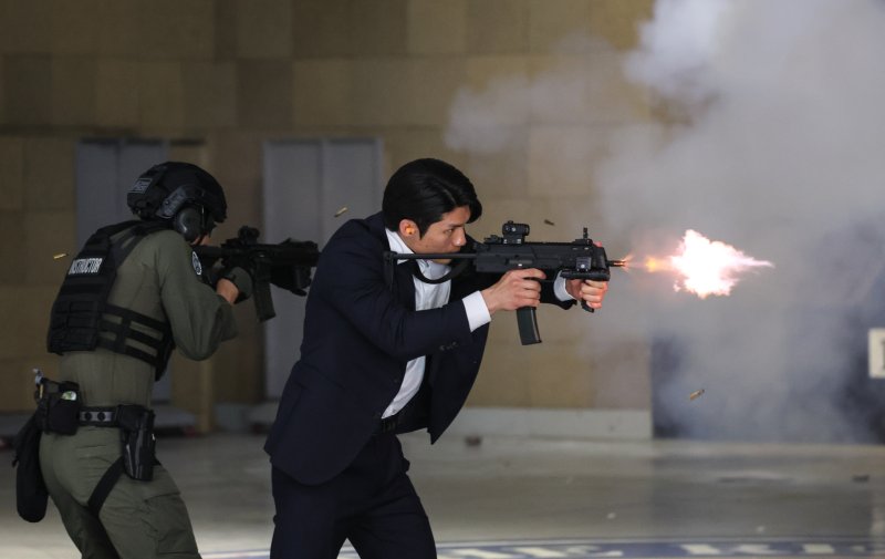 대통령경호처가 제21대 대통령 취임식을 일주일 앞둔 27일 서울 강서구 경호안전교육원에서 대통령의 절대 안전 확보를 위한 경호 훈련 현장을 언론에 공개했다. 경호요원들이 사격훈련을 하고 있다. 2025.5.27/뉴스1 ⓒ News1 허경 기자