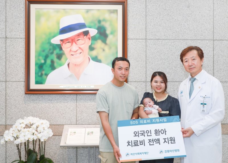 쩐푹안 군과 부모 (출처=연합뉴스)