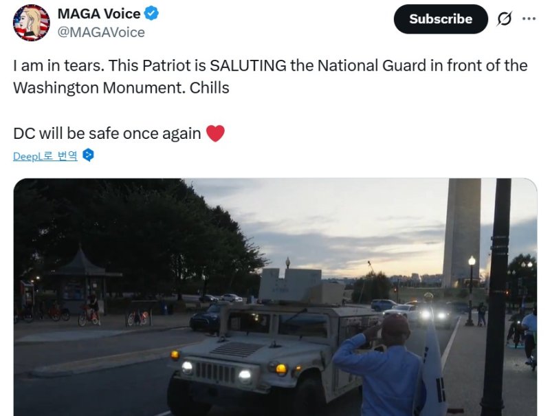 [워싱턴=뉴시스]미국 독립언론인 프리덤뉴스TV는 트럼프 대통령 지시에 따라 워싱턴DC 주방위군의 시내 배치가 시작된 지난 12일(현지 시간) 공개한 영상으로, 워싱턴기념탑 인근에서 군인들을 태운 장갑차가 지나가자 태극기를 지참한 시민이 경례를 하고 있는 모습. (사진=프리덤뉴스TV 영상 캡쳐).2025.08.15. *재판매 및 DB 금지
