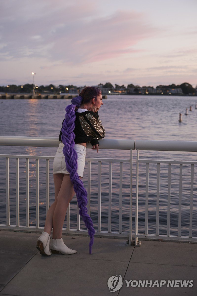 케이팝 데몬 헌터스 주인공으로 분장한 여성 (출처=연합뉴스)