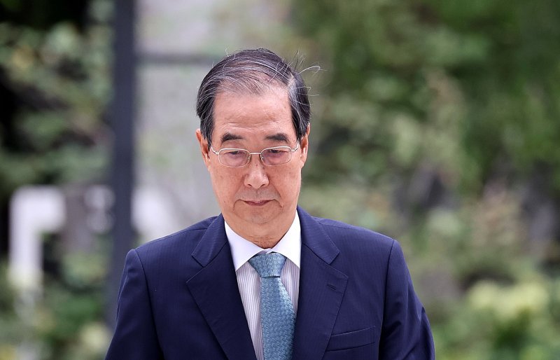 한덕수 전 총리가 9일 서울 종로구 광화문에 마련된 김건희 특검팀 사무실에 조사를 받기 위해 출석하고 있다. 2025.9.9/뉴스1 ⓒ News1 박지혜 기자