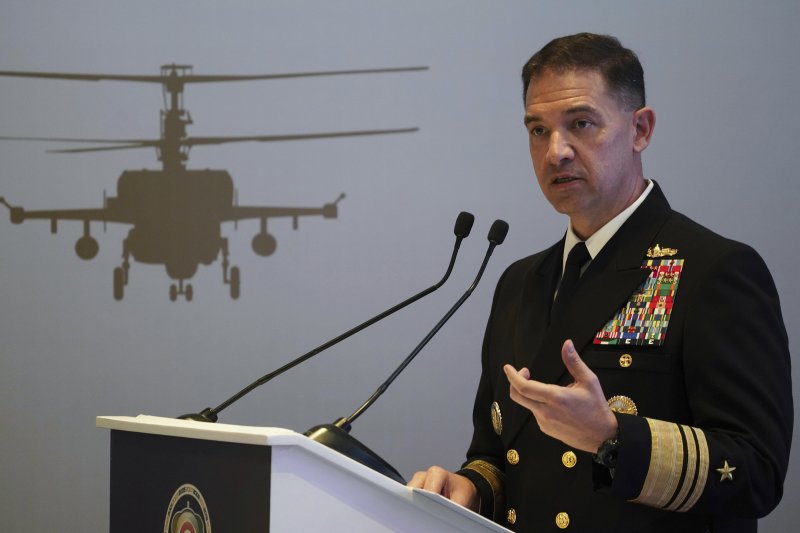 FILE - U.S. Navy Vice Adm. Brad Cooper, who heads the Navy's Bahrain-based 5th Fleet, speaks at an event at the International Defense Exhibition and Conference in Abu Dhabi, United Arab Emirates, Feb. 21, 2023. Iran is "very directly involved" in attacks by Yemen's Houthi rebels on shipping over Isr
