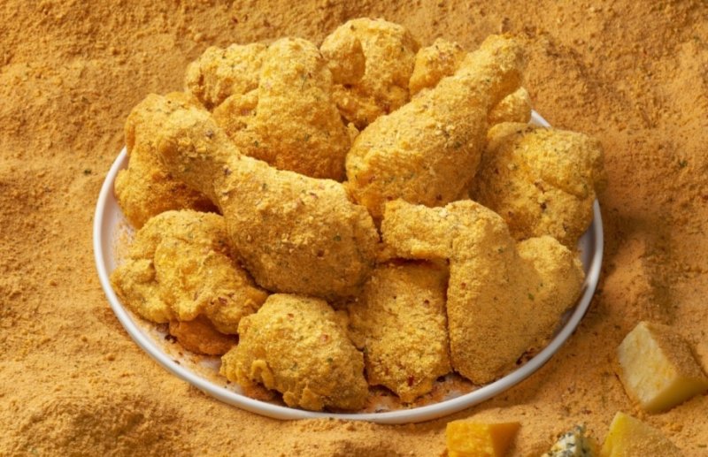 [서울=뉴시스] 제너시스BBQ 그룹이 지난 9월 출시한 치킨 신메뉴 '뿜치킹'. photo@newsis.com