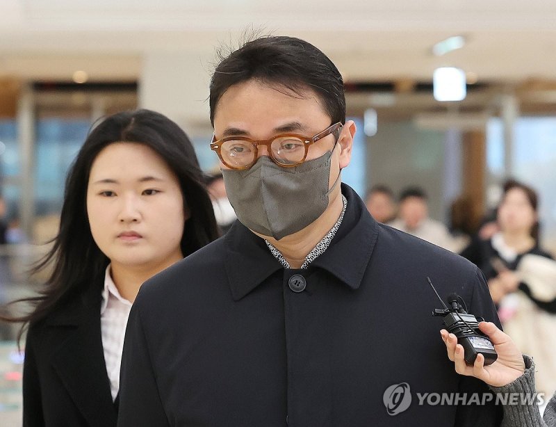 특검 출석하는 김진우씨 (출처=연합뉴스)