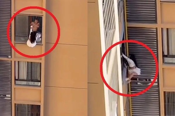 중국의 한 고층 아파트에서 유부남과 불륜을 저지르고 있던 한 여성이 아내에게 들킬 위기에 처하자 창문 밖으로 매달리는 아찔한 상황이 벌어졌다. 사진=SNS