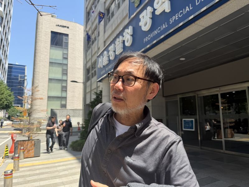 질문에 답하는 김순환 서민위 사무총장 (출처=연합뉴스)