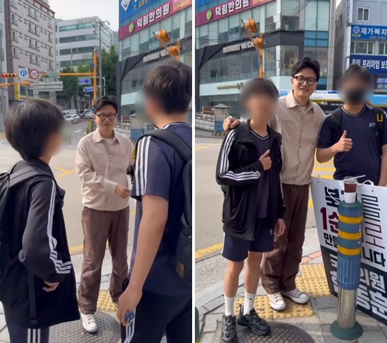 한동훈 부산 북구갑 무소속 의원이 9일 자신의 SNS에 '북구를 1순위로 만들겠습니다'라는 문구가 적힌 손팻말을 들고 지역구에서 당선 인사를 하는 모습을 공개했다. 공개된 영상에는 중학생 아이들과 나누는 대화가 담겨 있다. /사진=한동훈 의원 페이스북 캡처