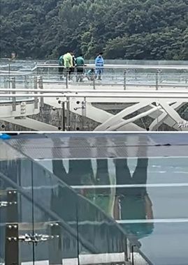 180m 높이 세계 최대 유리 전망대, 우산으로 찍자 '쩍'…혼비백산 소동