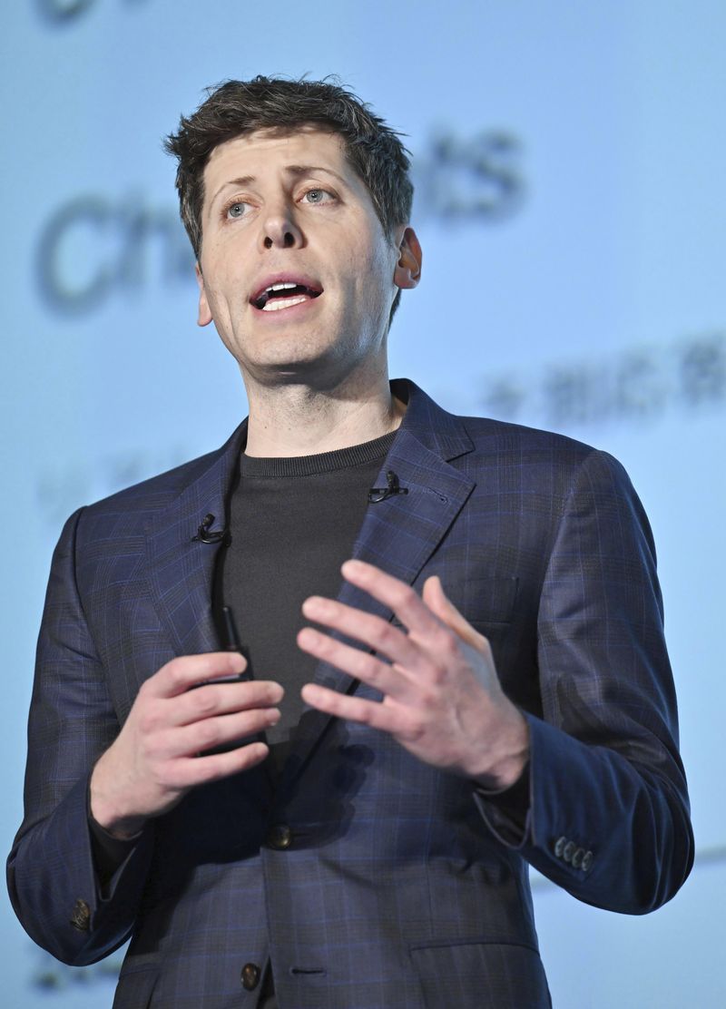 OpenAI Chief Sam Altman delivers a speech during an event for enterprises, with SoftBank Chief Masayoshi Son, in Tokyo, in Tokyo, Monday, Feb. 3, 2025. (Kyodo News via AP)