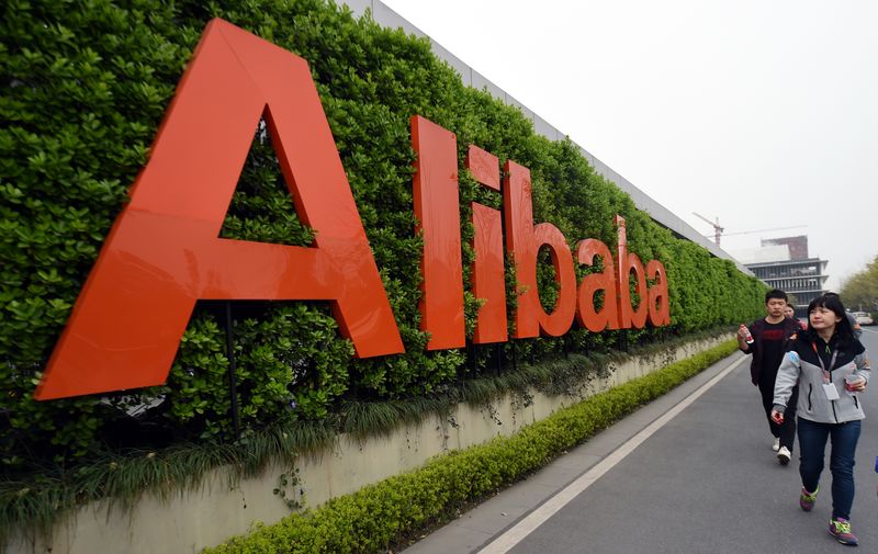 People walk past a logo of China's e-commerce giant Alibaba in Hangzhou, capital of east China's Zhejiang Province, March 21, 2016. (Xinhua/Wang Dingchang) HANGZHOU, March 11 (Xinhua) -- Chinese e-commerce powerhouse Alibaba has agreed to invest 4.66 billion yuan (about 693 million U.S. dollars) in 