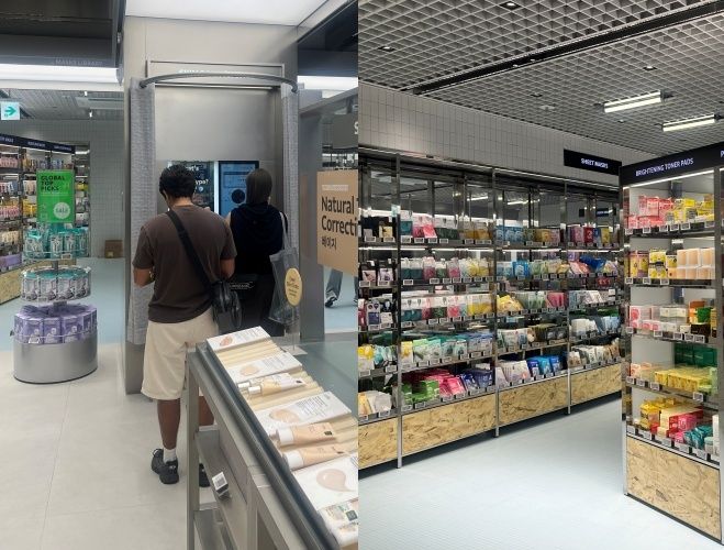 올리브영 부산 남포 타운 매장에서 피부 진단 기기를 이용하는 호주 관광객(왼쪽)과 마스크팩 라이브러리 공간 ⓒ 뉴스1 박혜연 기자