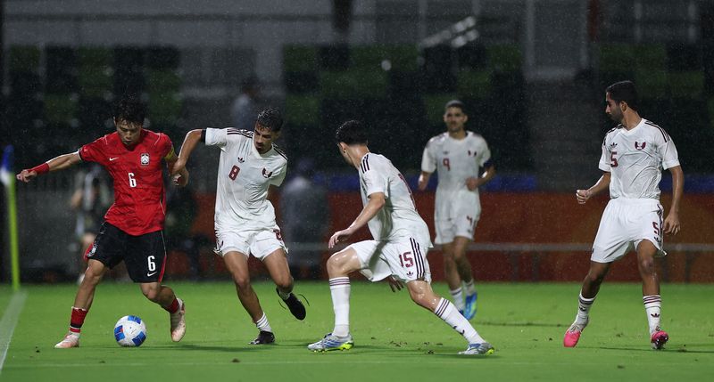 15일 일본 나고야 미즈호 공원 럭비경기장에서 열린 2026 아이치·나고야 아시안게임 남자 축구 D조 1차전 대한민국 대 카타르의 경기. 한국 이기혁이 볼다툼을 벌이고 있다. 연합뉴스