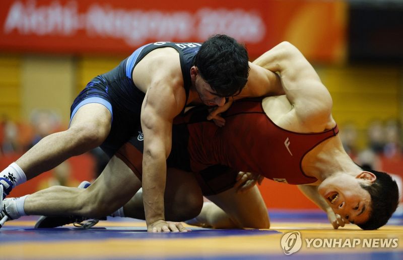 동메달 결정전 치르는 김다현(오른쪽) (출처=연합뉴스)