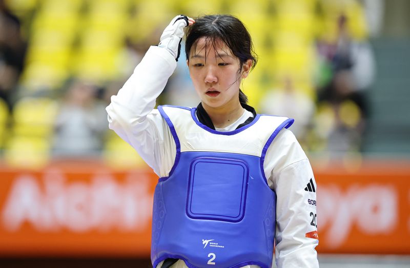 대한민국 이유민이 2일 일본 도요하시 체육관에서 열린 2026 아이치·나고야 아시안게임 태권도 겨루기 여자 -49kg급 8강에서 중국 마징유에에 패배 후 아쉬워하고 있다. 2026.10.2 ⓒ 뉴스1 김도우 기자
