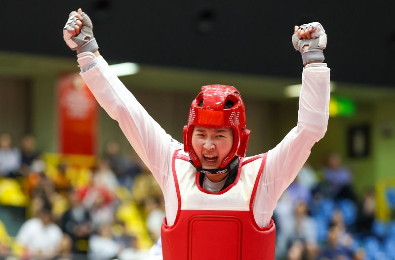 대한민국 송다빈이 3일 일본 도요하시 체육관에서 열린 2026 아이치·나고야 아시안게임 태권도 여자 +67㎏급 결승전에서 중국 무원저를 꺾고 금메달을 확정 짓자 기뻐하고 있다. 2026.10.3 ⓒ 뉴스1 안은나 기자