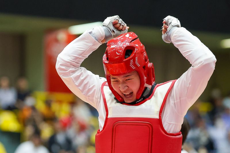 대한민국 송다빈이 3일 일본 도요하시 체육관에서 열린 2026 아이치·나고야 아시안게임 태권도 여자 +67㎏급 결승전에서 중국 무원저를 꺾고 금메달을 확정 짓자 기뻐하고 있다. 2026.10.3 ⓒ 뉴스1 안은나 기자