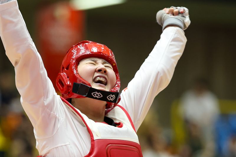 대한민국 송다빈이 3일 일본 도요하시 체육관에서 열린 2026 아이치·나고야 아시안게임 태권도 여자 +67㎏급 결승전에서 중국 무원저를 꺾고 금메달을 확정 짓자 기뻐하고 있다. 2026.10.3 ⓒ 뉴스1 안은나 기자
